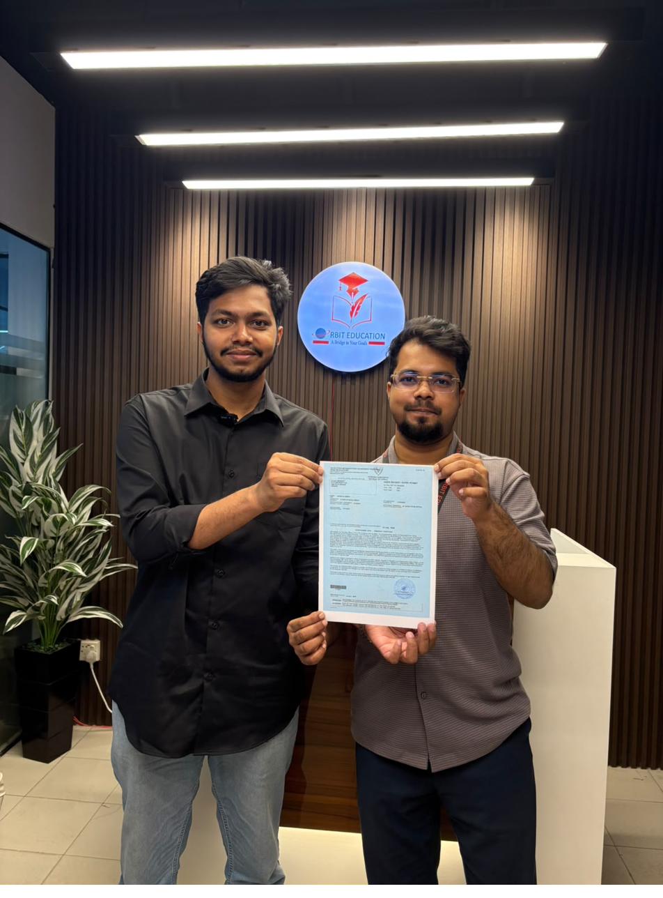 Taibal Jaman at the Orbit Education office after a student visa approval